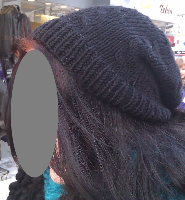 She looks cool with the hat.